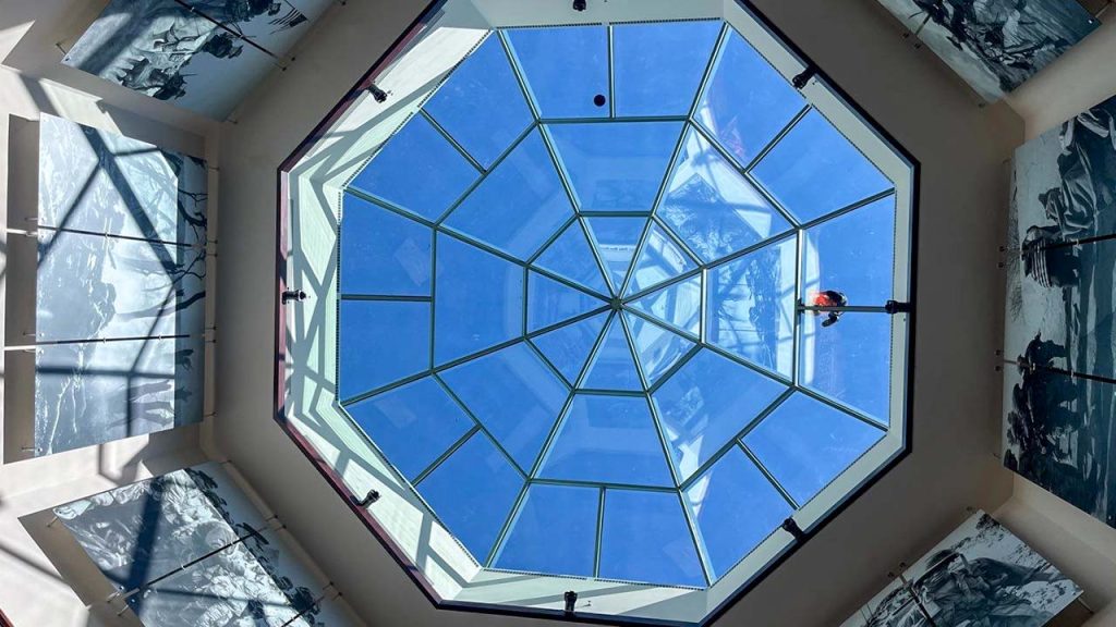 A clear sky view from the library's interior.