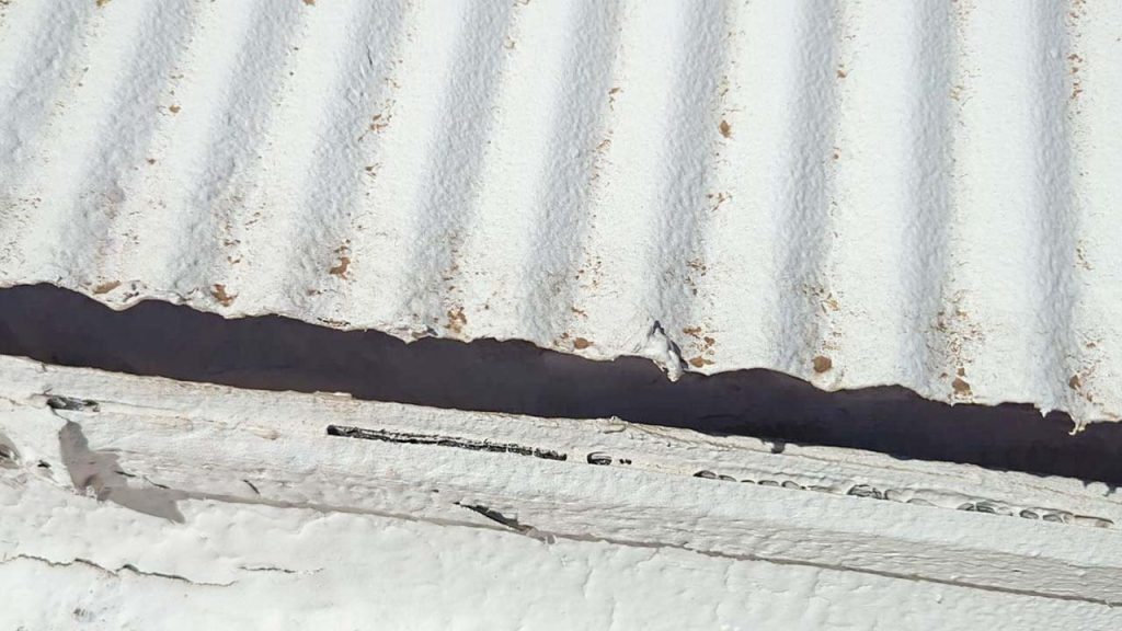 A close-up of the corrugated metal covering the skylight.