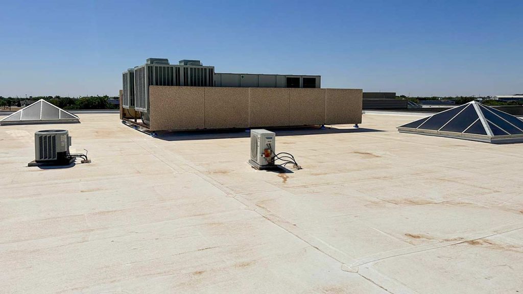 One of two pairs of pyramid skylights on one of two buildings.