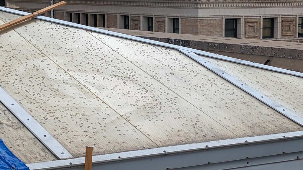 Hail damaged skylight glazing.