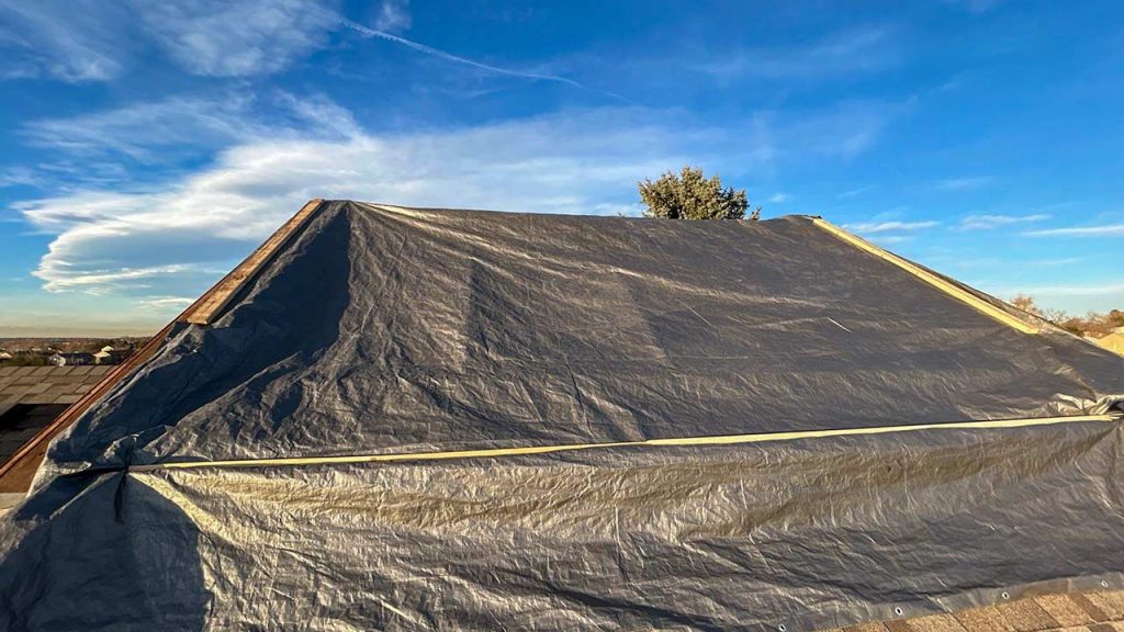 The skylight is covered with a tarp for the night.