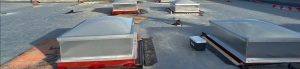 An image of two dome skylights on a roof.