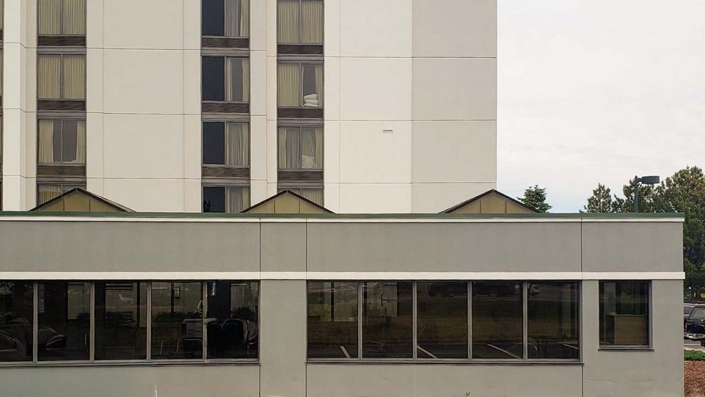 Three ridge skylighys sit on the roof above the indoor pool room.