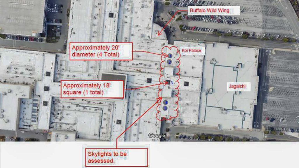 Aerial view of a building locating skylight project on the roof as seen on Google Maps.