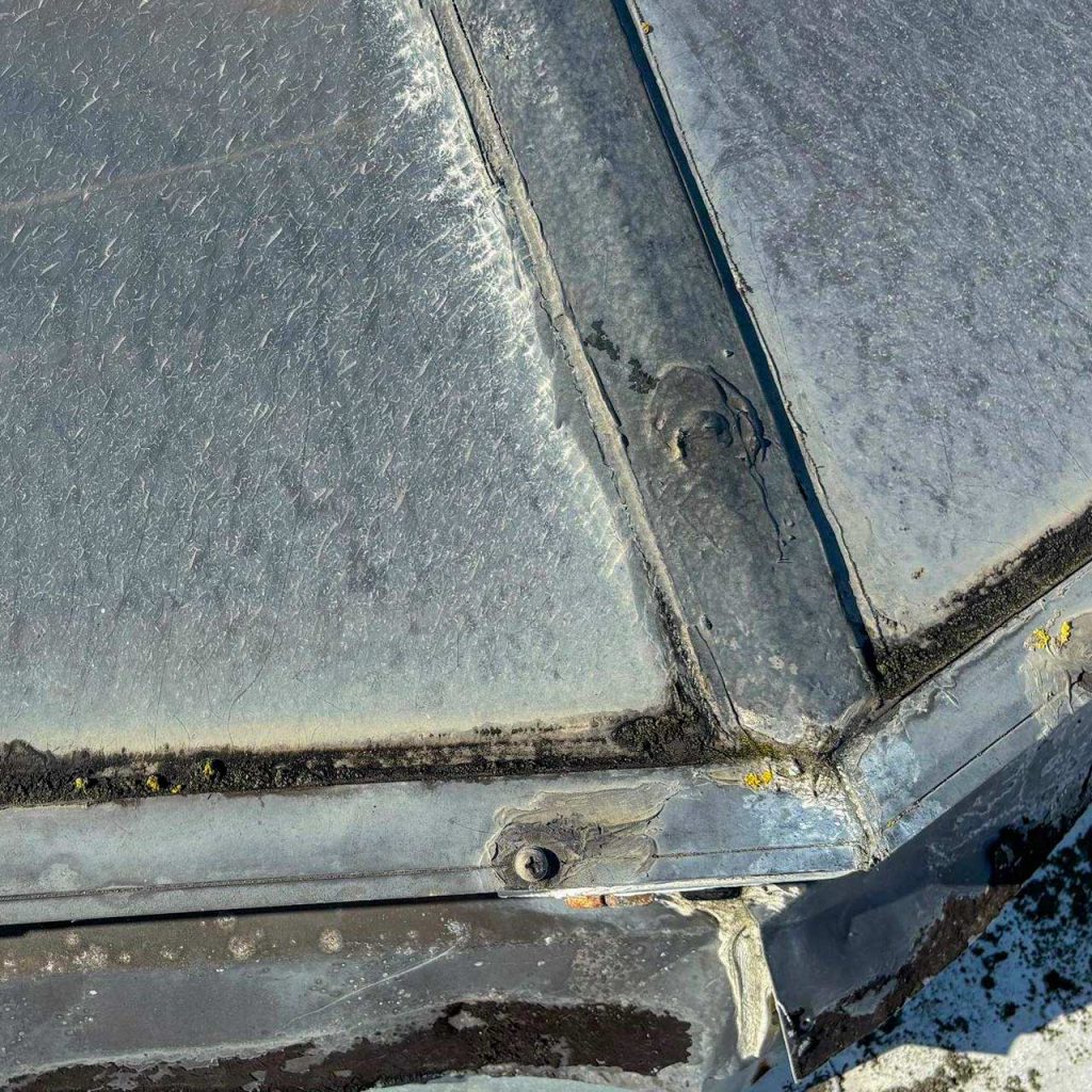 Close up of severely weathered skylight sections