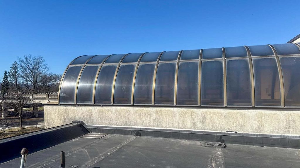 A spacious roof topped with a large polymerbarrel vault skylight.