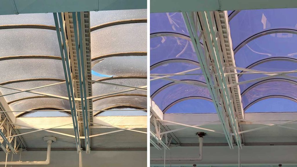 Before and after comparison of arched skylights in an industrial setting. The left shows dirty and clouded glazing, while the right shows clean, clear glazing.